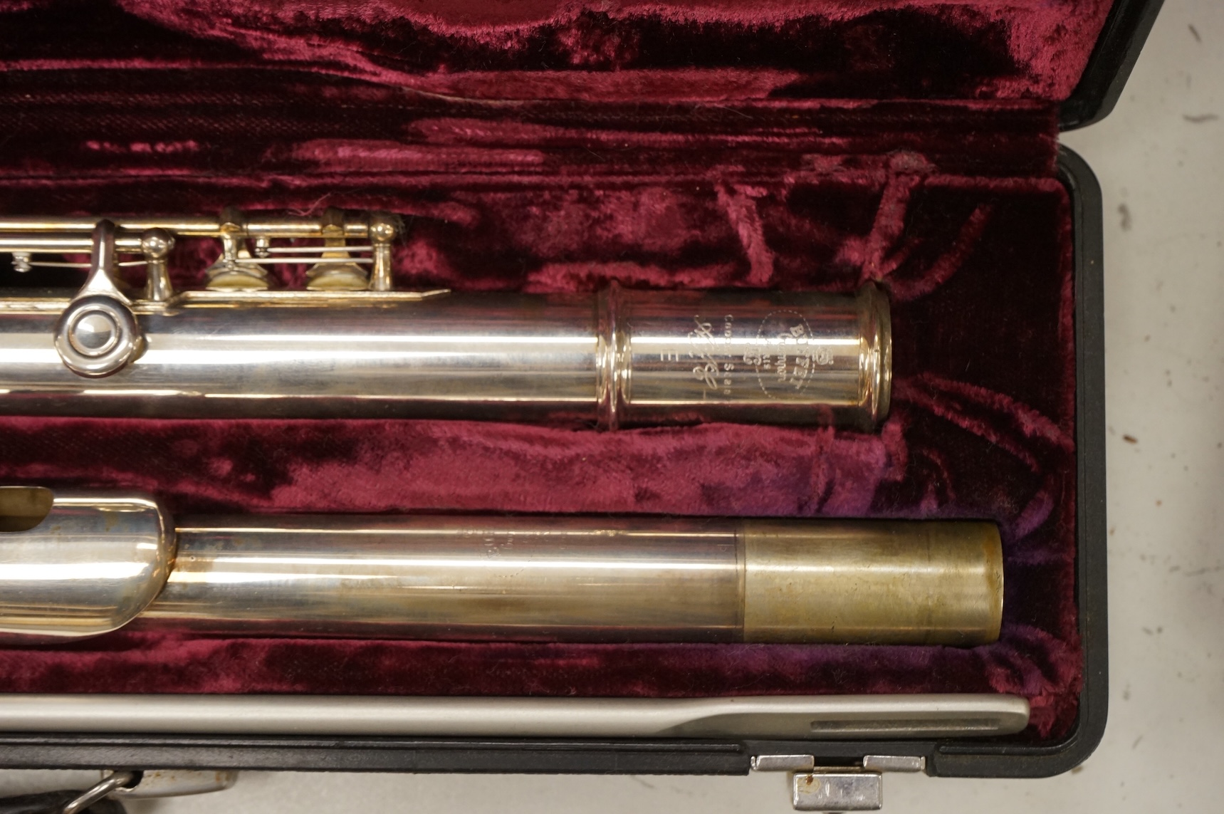 Three musical instruments to include a Buffet flute and violin with two bows